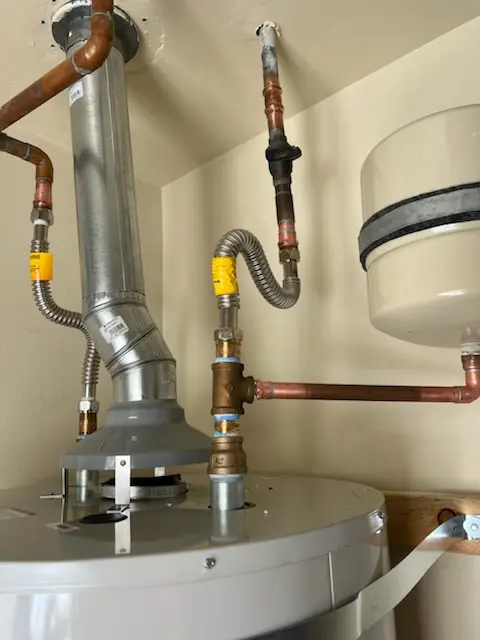 Water heater installation and plumbing repair in Houghton